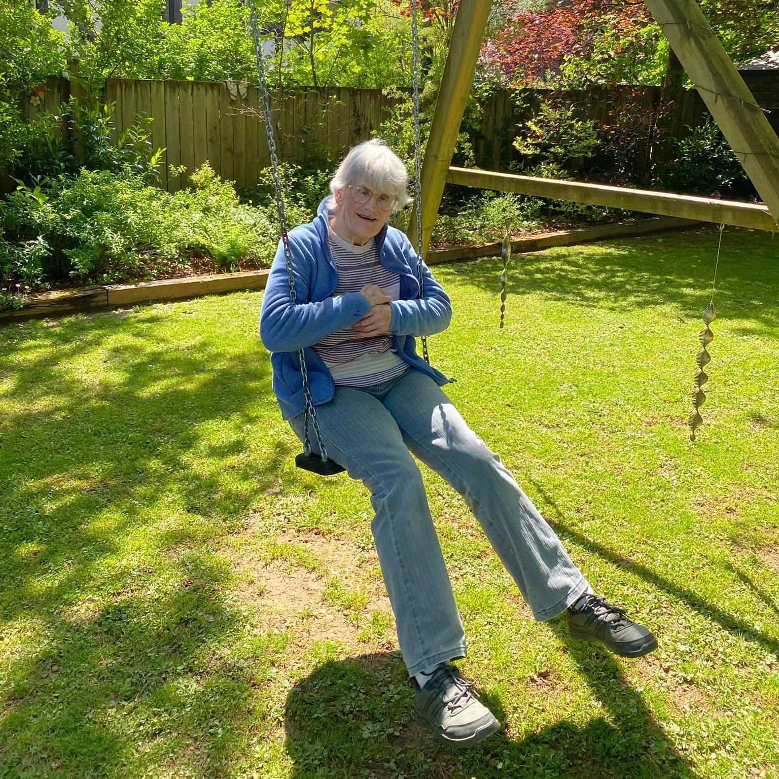 Enjoying the garden swings in the sun