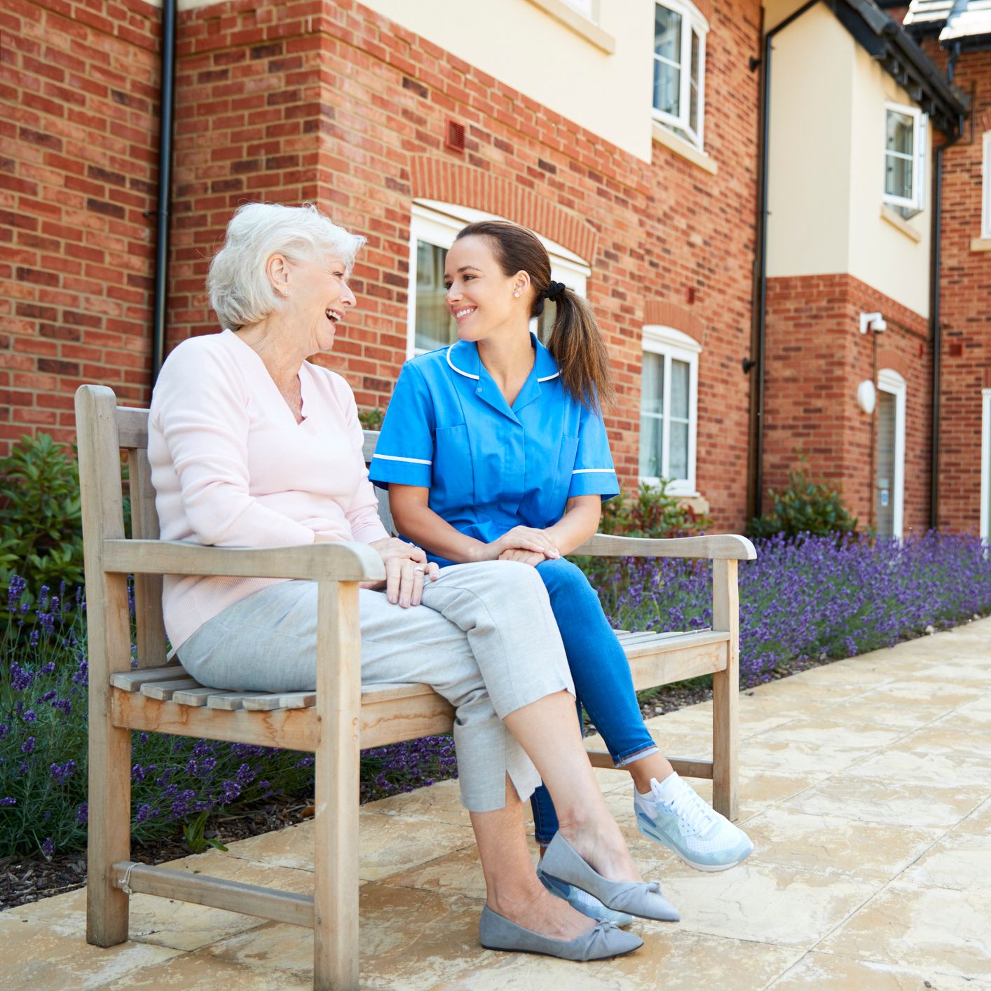 carer-resident-chatting-and-smiling.jpg