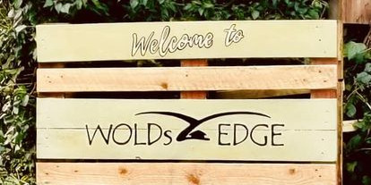 Wooden Sign at Wolds Edge