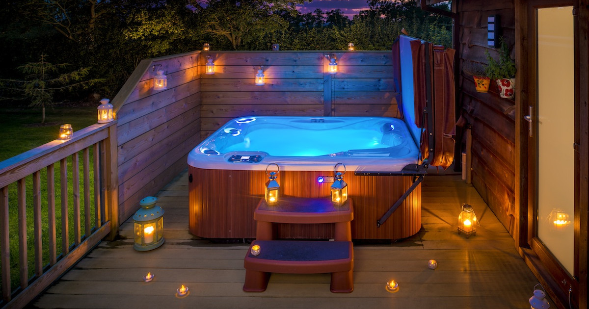 Honeydale Hot Tub with fairy lights and lanterns