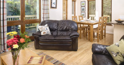 Kingfisher Lodge Living Space with large sofas in the living room