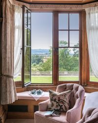 Plush armchair looking out across the gardens