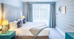 Bedroom with accessible door ways and accessible bathroom