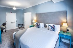 Bedroom with accessible door ways and accessible bathroom