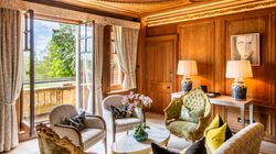 Seating Area in Room in front of open window and balcony