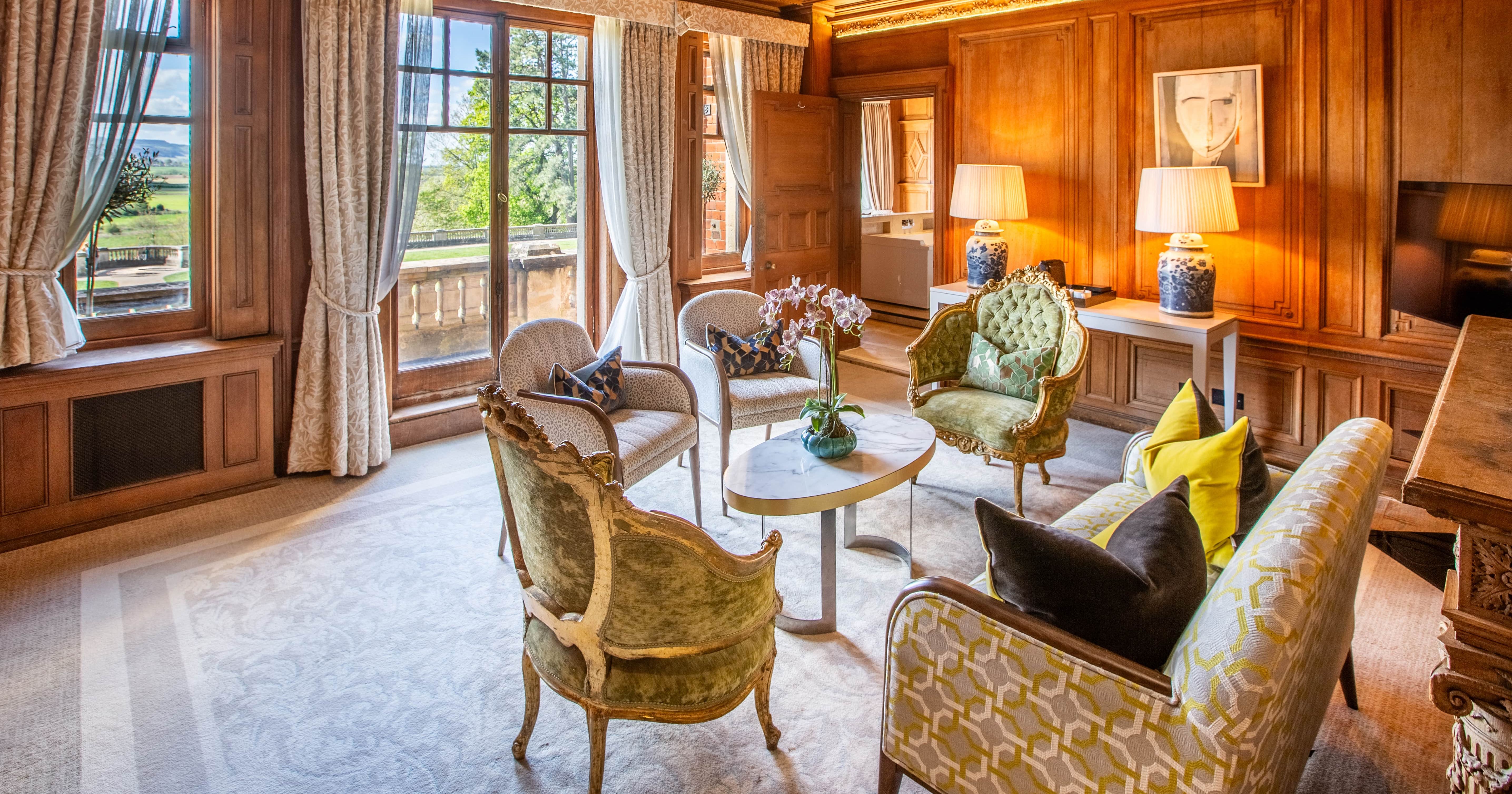 Lounge Area with wide window opposite and two lamps