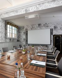 Board meeting set up in the old kitchen
