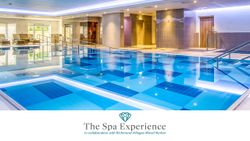 Modern indoor spa pool with lounge chairs and ambient lighting