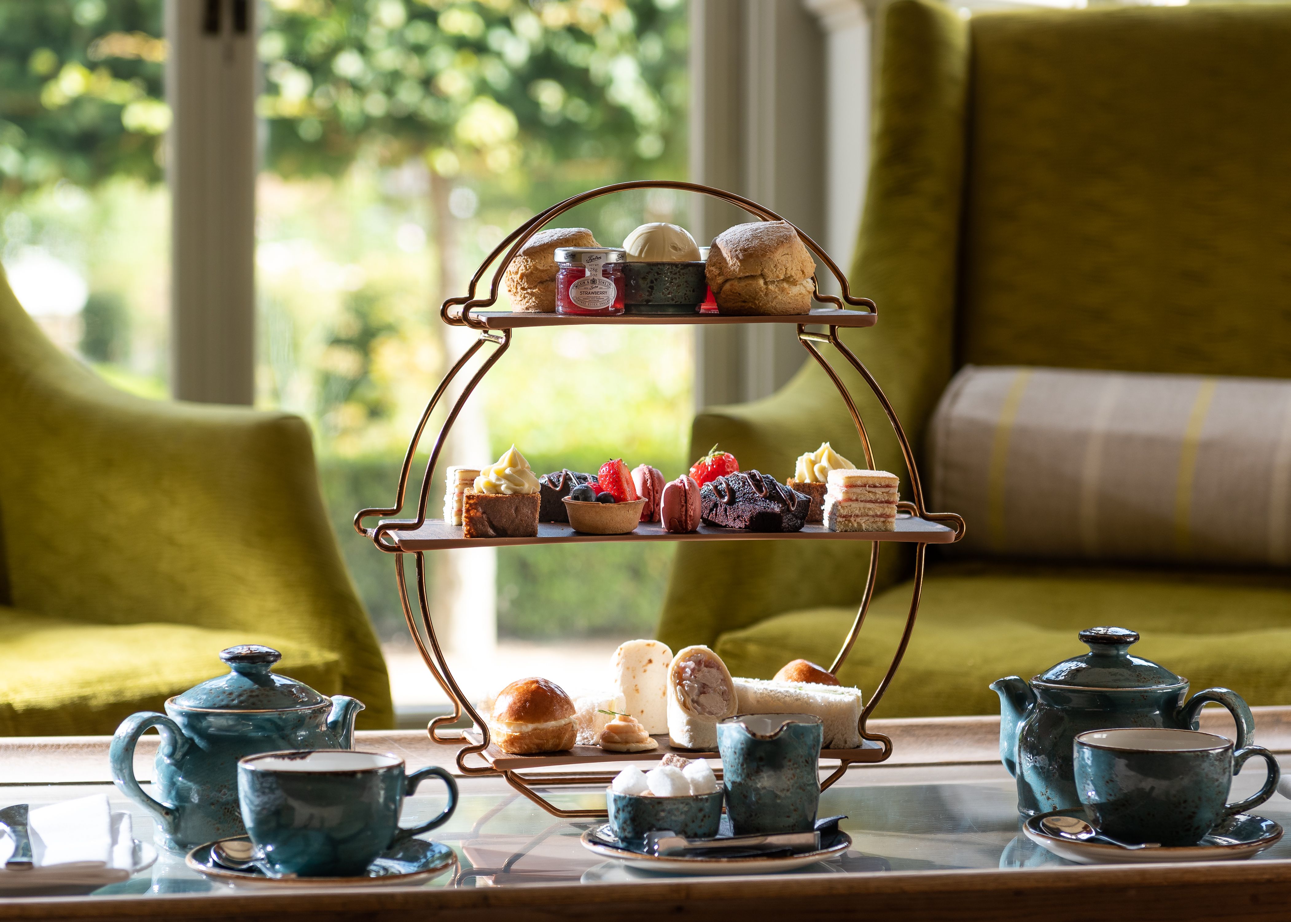afternoon tea on a beautiful metal tiered stand