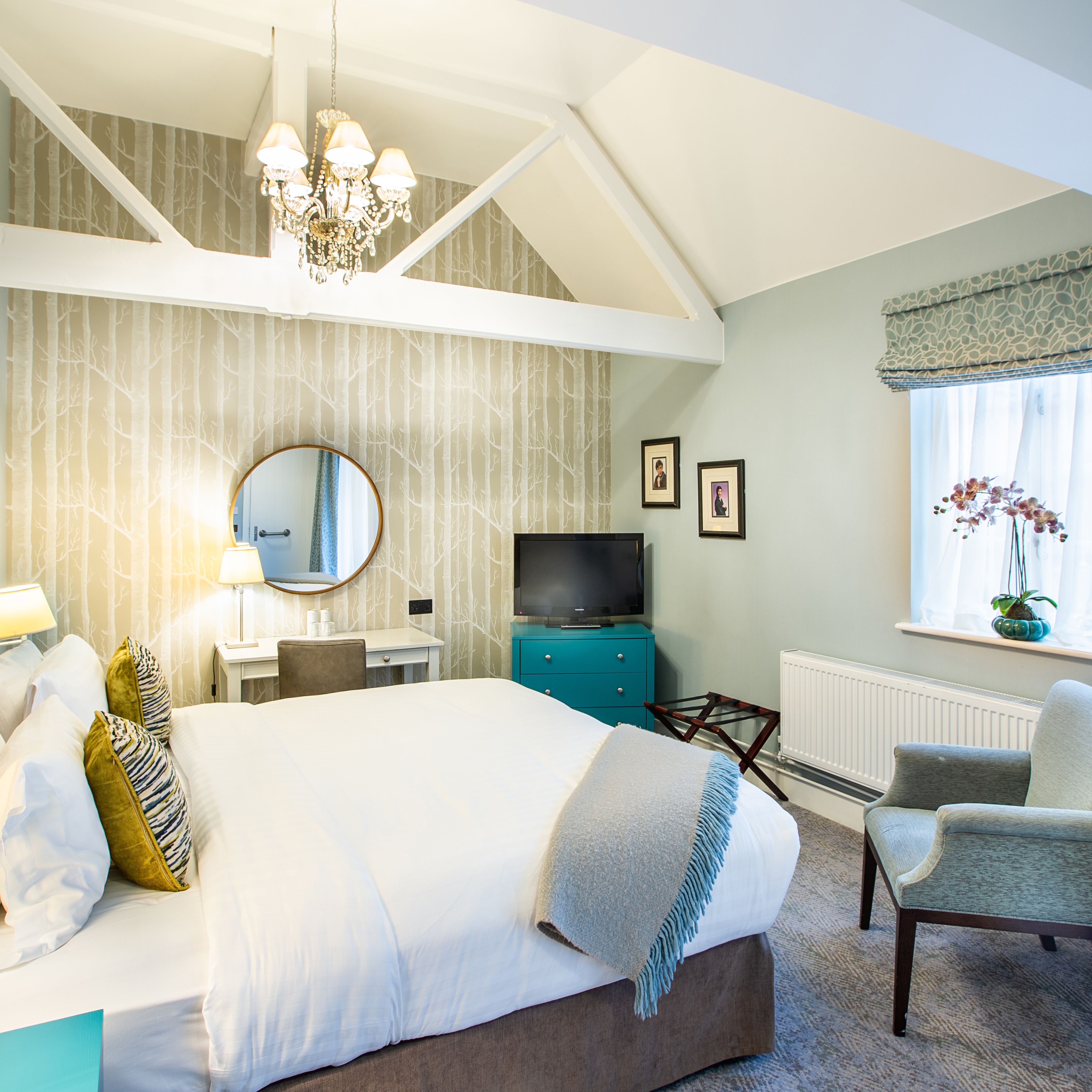 double room with beams in the roof