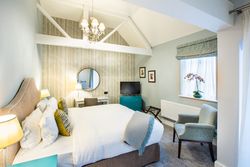 double room with beams in the roof