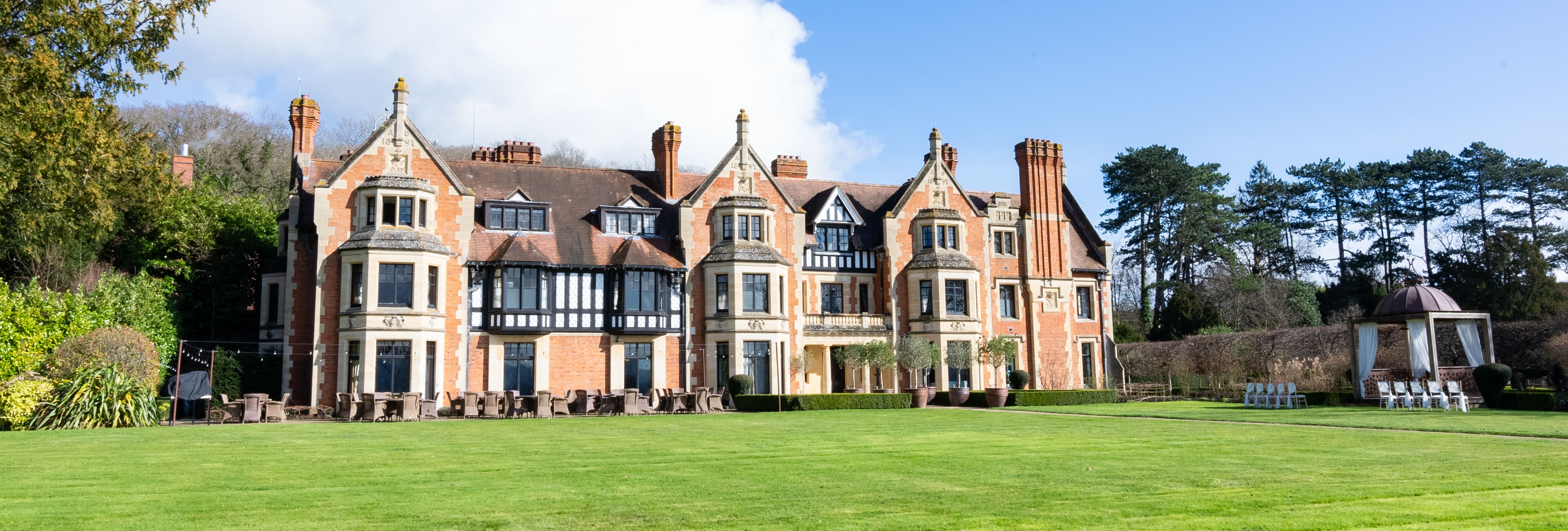 Wood Norton hotel exterior from across the gardens